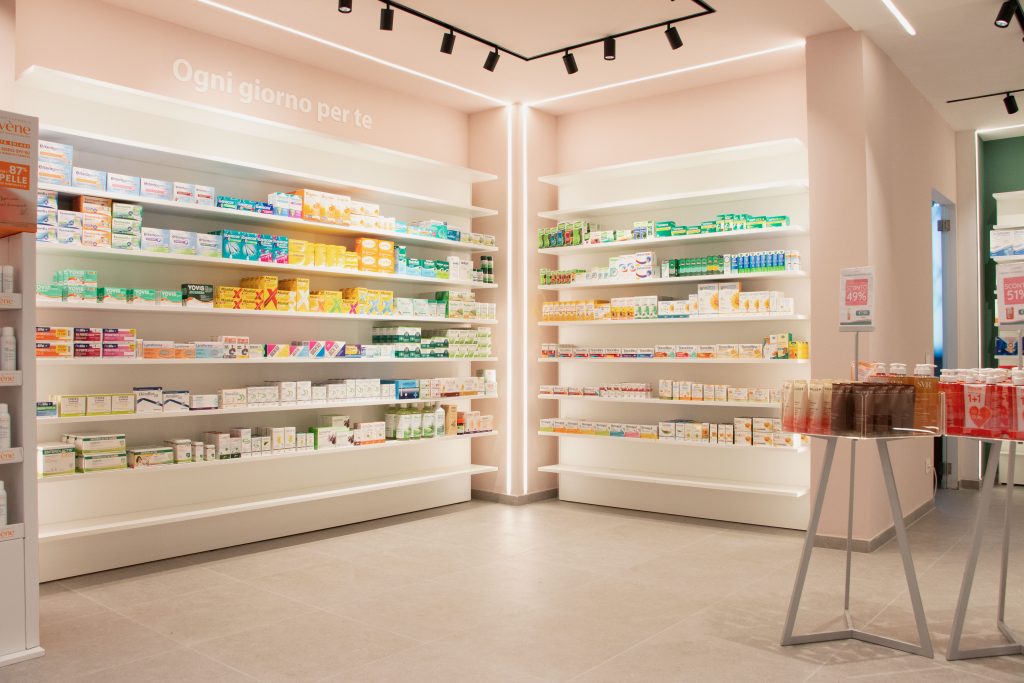Modern pharmacy interior showcasing diverse pharmaceutical products on shelves, promoting wellness and health.